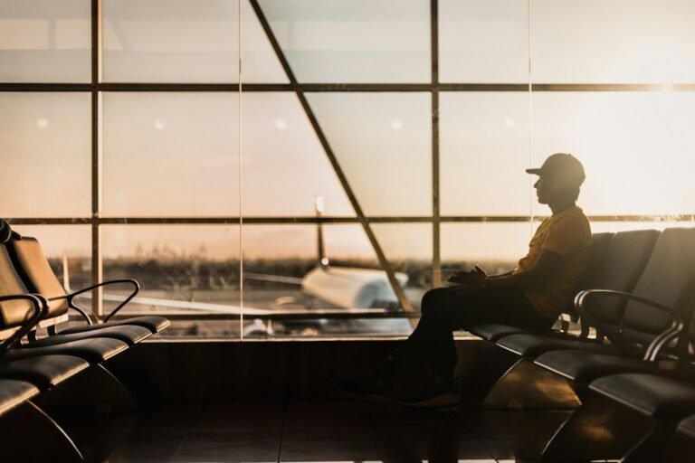 Barclays app not working abroad - traveller using a phone at the airport